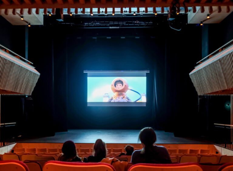 audience watching a film