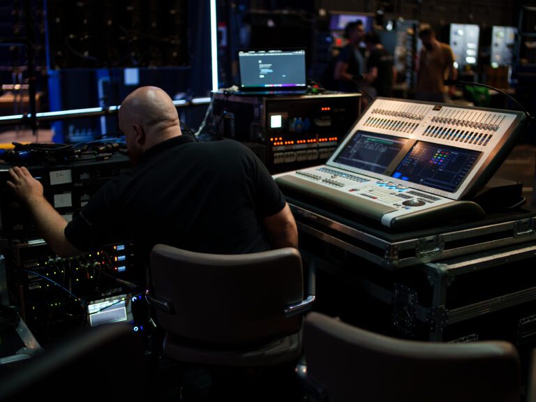 Image of a firefly employee behind different equipment