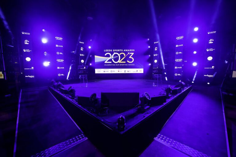 Leeds sports awards 2023 with image of the stage with purple lighting