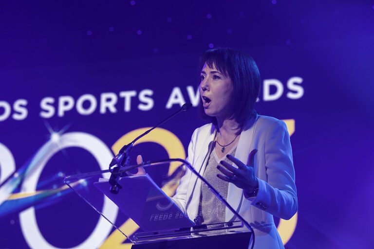 Image of a lady speaking at the Leeds sports awards 2023