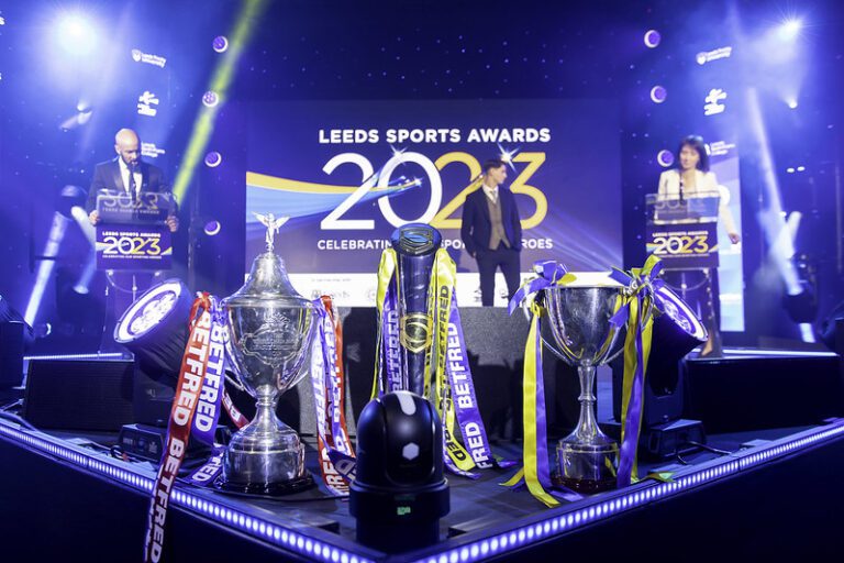 2023 Leeds Sports awards with 3 trophies