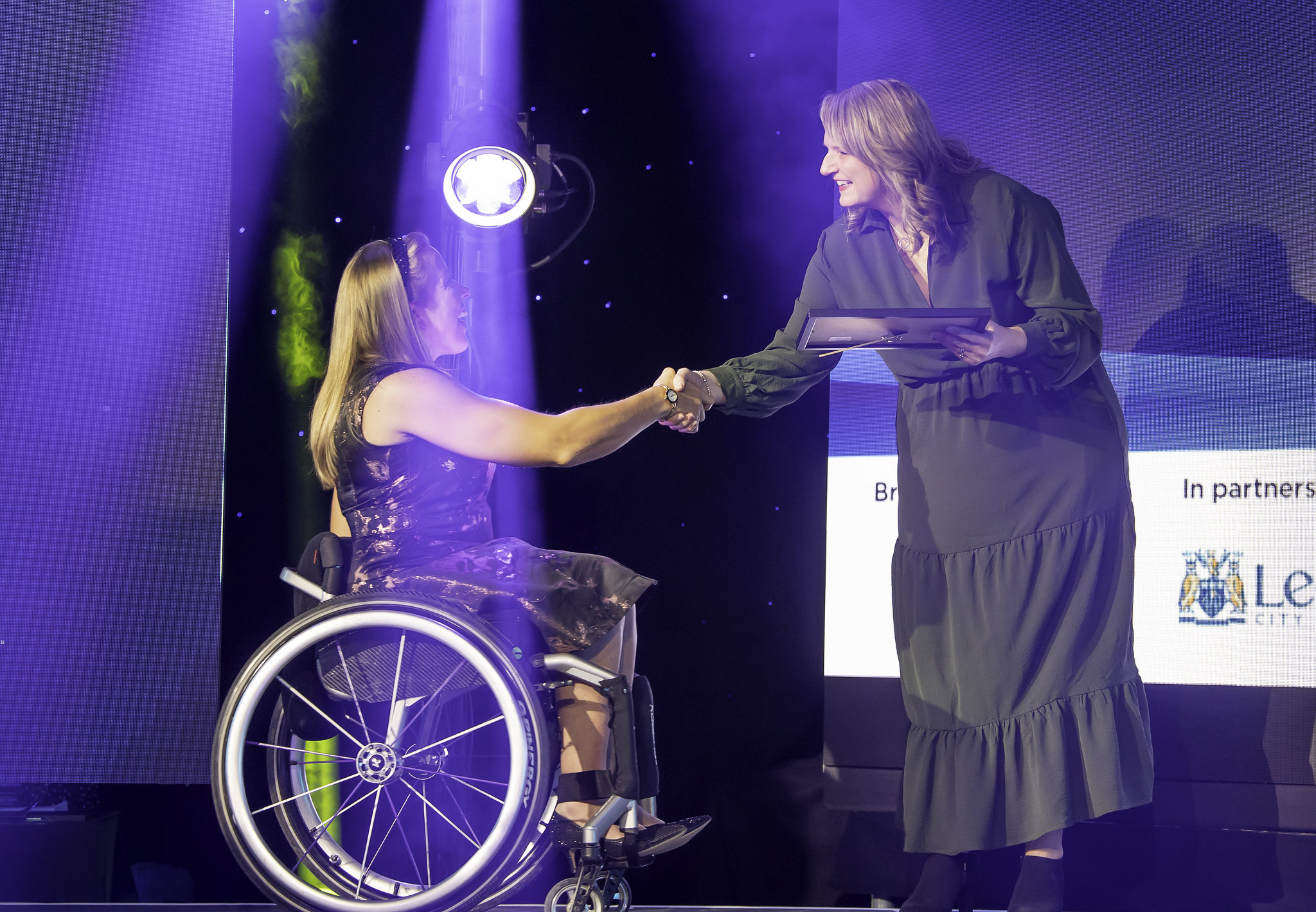Lady in a wheel chair at the Leeds city council show